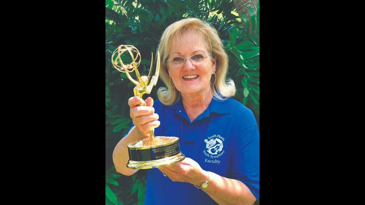 South Florida Youth Symphony Executive and Music Director Marjorie Hahn holds a prestigious Emmy Award. Concertgoers will get the once-in-a-lifetime opportunity to hold and take photos with the Emmy. 