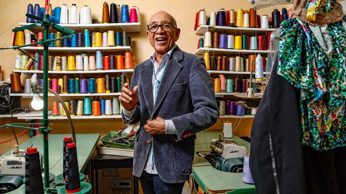 Fidel Aquino, the owner and tailor at Sastreria & Confecciones Aquino, works at his shop in Miami’s Allapattah neighborhood on Wednesday, Sept. 20, 2023. Aquino was able to recently buy six new sewing machines for his sewing and altering.