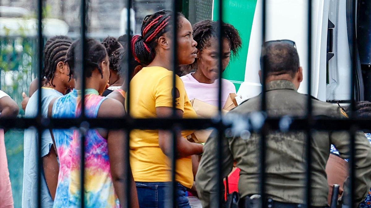 Haitian migrants prepare to depart the U.S. Customs and Border Protection station in the Middle Florida Keys city of Marathon Wednesday, June 26, 2024. They were among a group of almost 120 people who arrived earlier in the morning on a migrant boat in Key West.