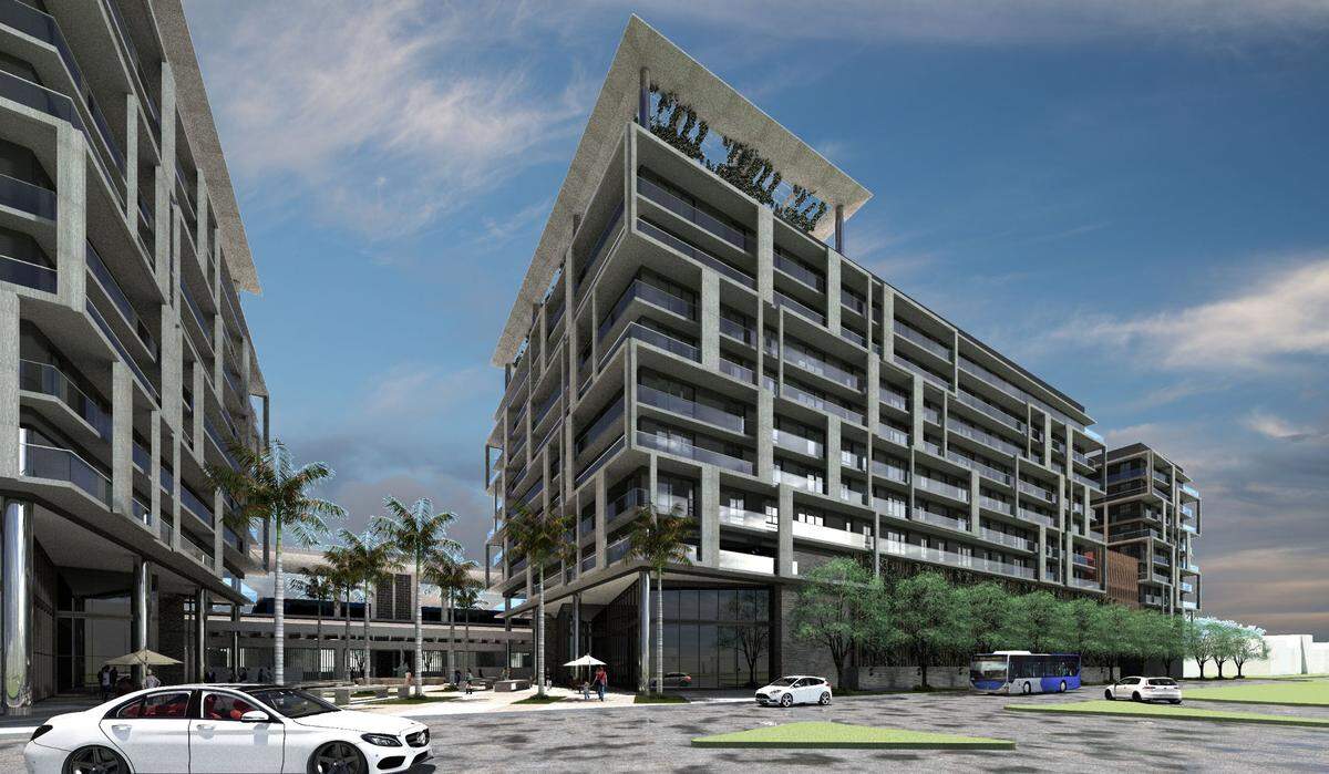 A rendering depicts Mill Creek’s redevelopment proposal for the Vizcaya Metrorail Station as seen from The Roads neighborhood, with the train platform at center.