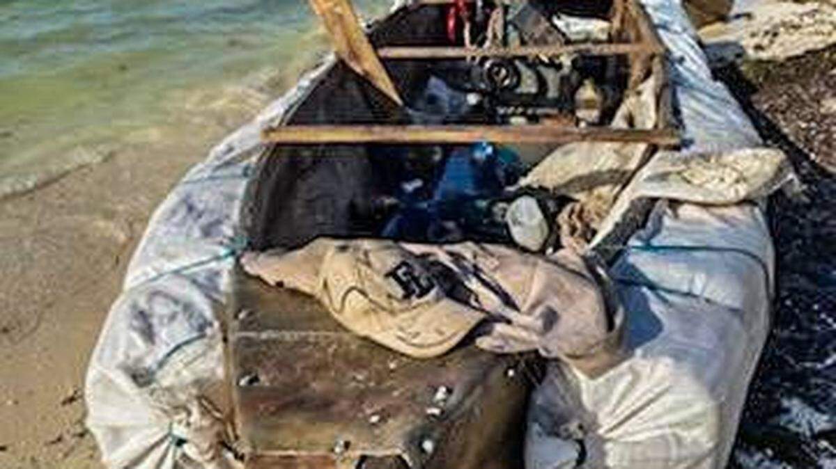 A makeshift raft rests on the shoe of Key Colony Beach in the Florida Keys Tuesday, Aug. 3, 2021. Six men from Cuba arrived in the Keys on the vessel.
