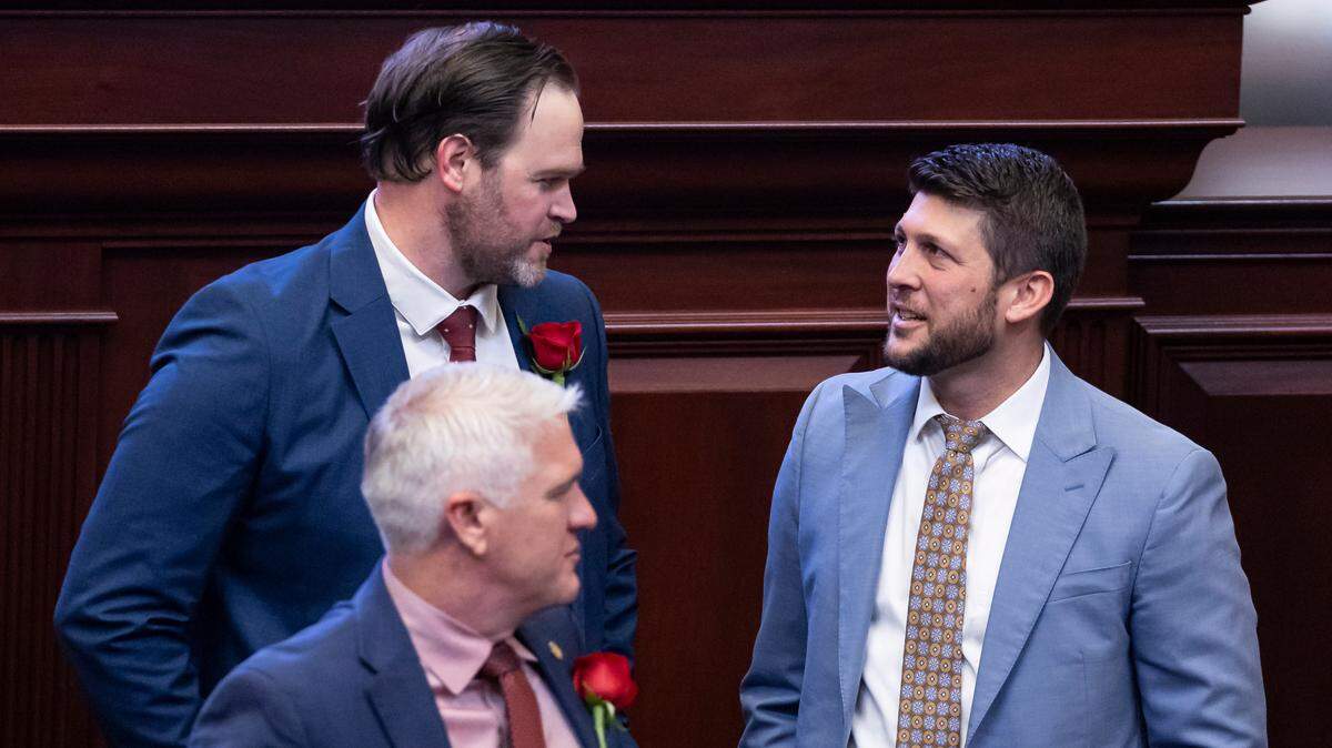 Florida State Rep. Alex Andrade, R-Pensacola, and Florida Attorney General James Uthmeier talk during the first day of the legislative session at the Florida State Capitol on Tuesday, March 4, 2025, in Tallahassee, Fla.