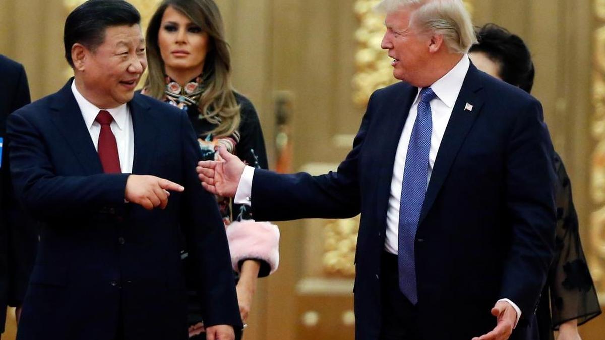 U.S. President Donald Trump China’s President Xi Jinping arrive for the state dinner with the first ladies at the Great Hall of the People in Beijing, China, in November. Trump has long vowed to fulfill his campaign pledge to clamp down on what he considers unfair Chinese trading practices. But his calls for about $50 billion in tariffs could complicate his efforts to maintain China’s support in his negotiations with North Korea.