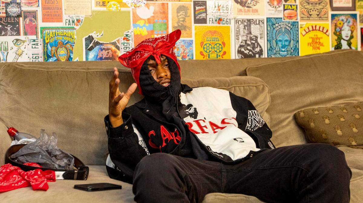 American rapper, singer, and songwriter Edy Edouard, known professionally as $NOT, sits in his green room before performing in front of a crowd of 300 people at the Lake Park Black Box inside The Kelsey Theater in Lake Park, Florida, on Saturday, May 15, 2021.