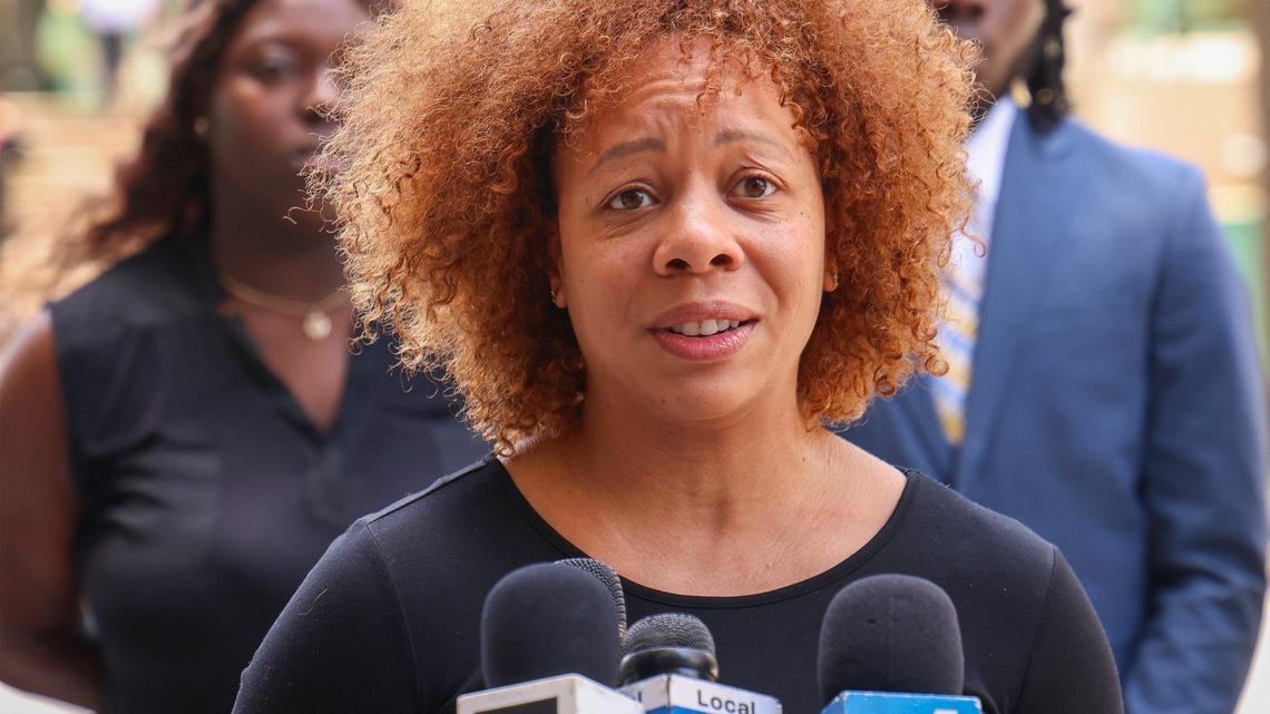 LaToya Ratlieff, center, speaks to the media during a press conference as attorneys announced lawsuit filed by her and others against Fort Lauderdale Police Department for the violent response to peaceful protesters at the May 31, 2020, George Floyd protest on Monday, June 3, 2024, in Fort Lauderdale, Florida.