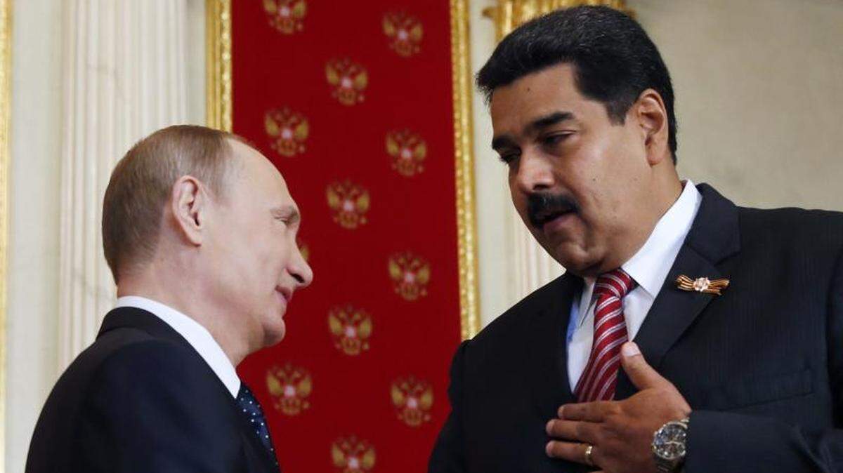 Though the head of Venezuela’s National Assembly declared himself president, Russia’s Vladimir Putin, left, are among those who likely will continue to prop up dictator Nicolás Maduro.