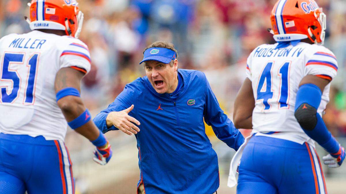 Florida Gators coach Dan Mullen rushes his team off the field in the 2nd half of an NCAA college football game against Florida State in Tallahassee, Fla., Saturday, Nov. 24, 2018. Florida defeated Florida State 41-14.
