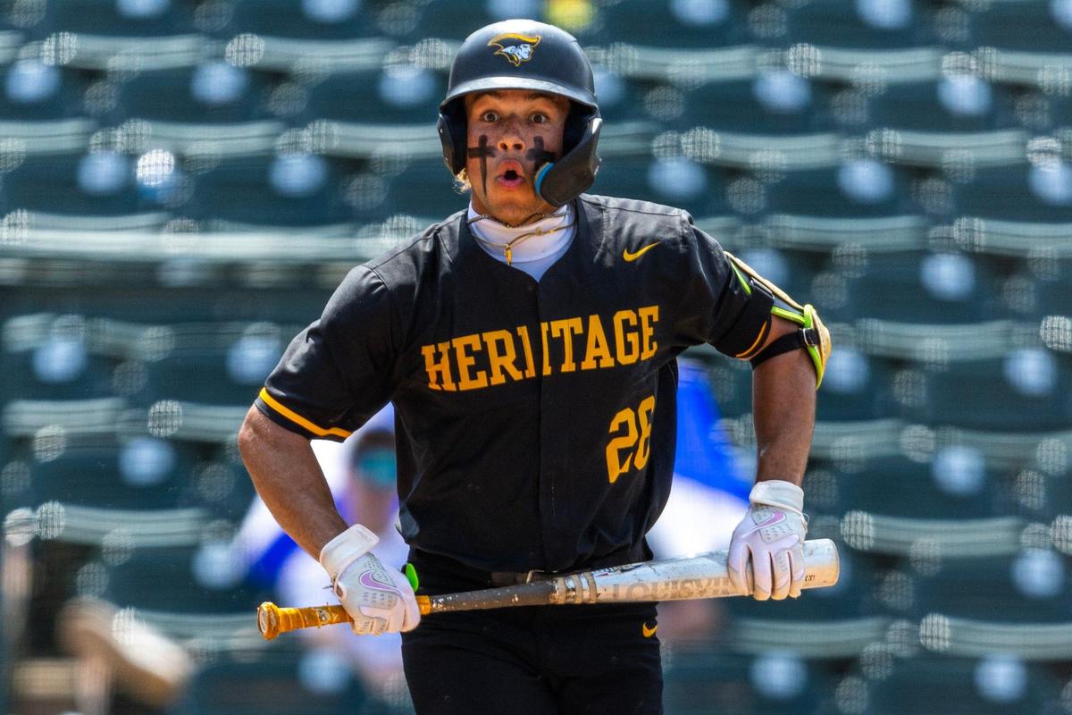 American Heritage batter Rafael Furcal (26) reacts to being called on strikes during the Class 5A state baseball championship game against Jesuit Tigers at Hammond Stadium on Saturday, May 18, 2024, in Fort Myers, Fla.