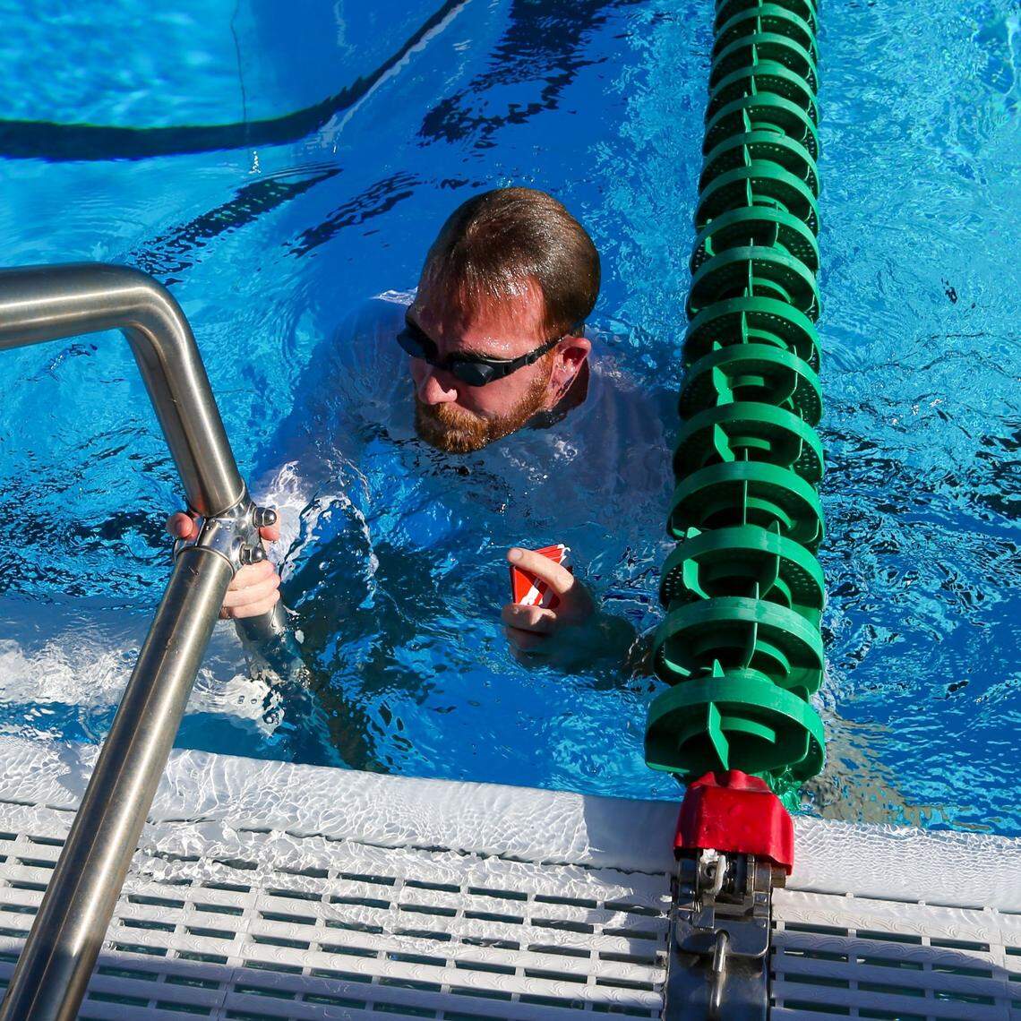 Hurricanes lecturer and memory athlete Nelson Dellis prepares to break the Guinness World record for fastest time to arrange a deck of cards memorized underwater on a single breath. 