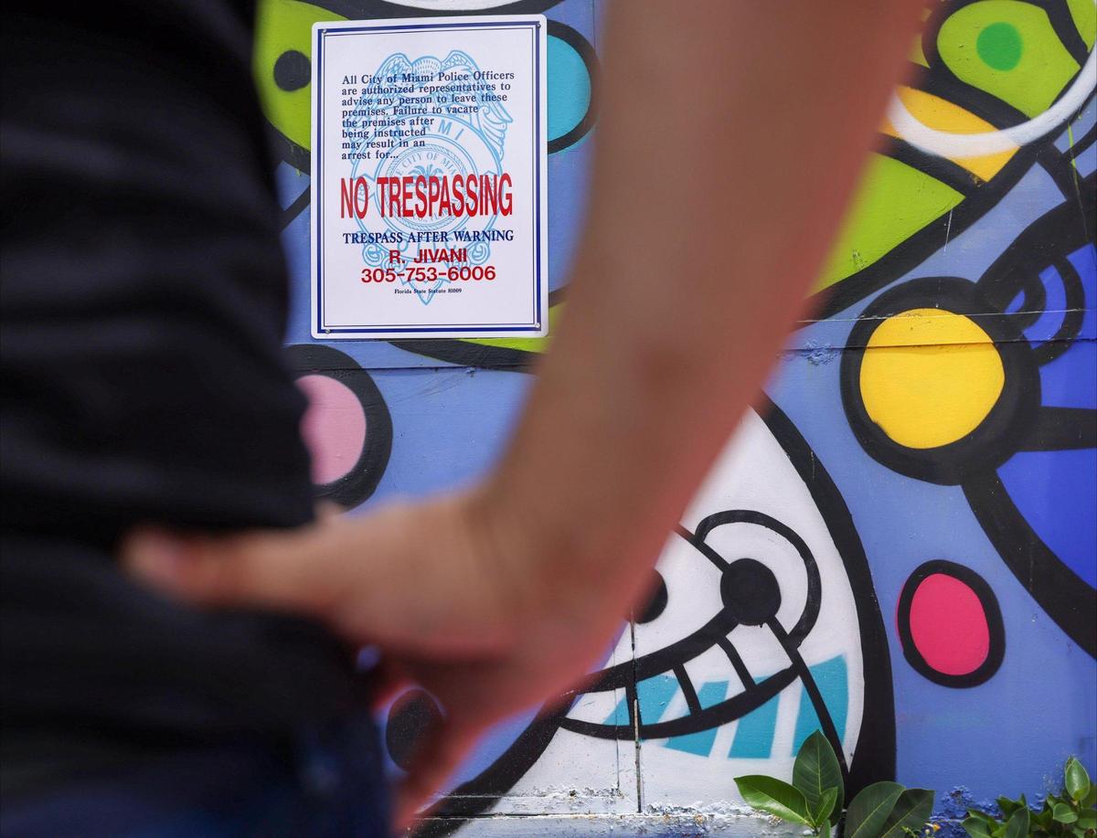 A no trespassing sign is displayed on the metal gate outside the former site of Esquina de Abuela on Tuesday, April 29, 2025.