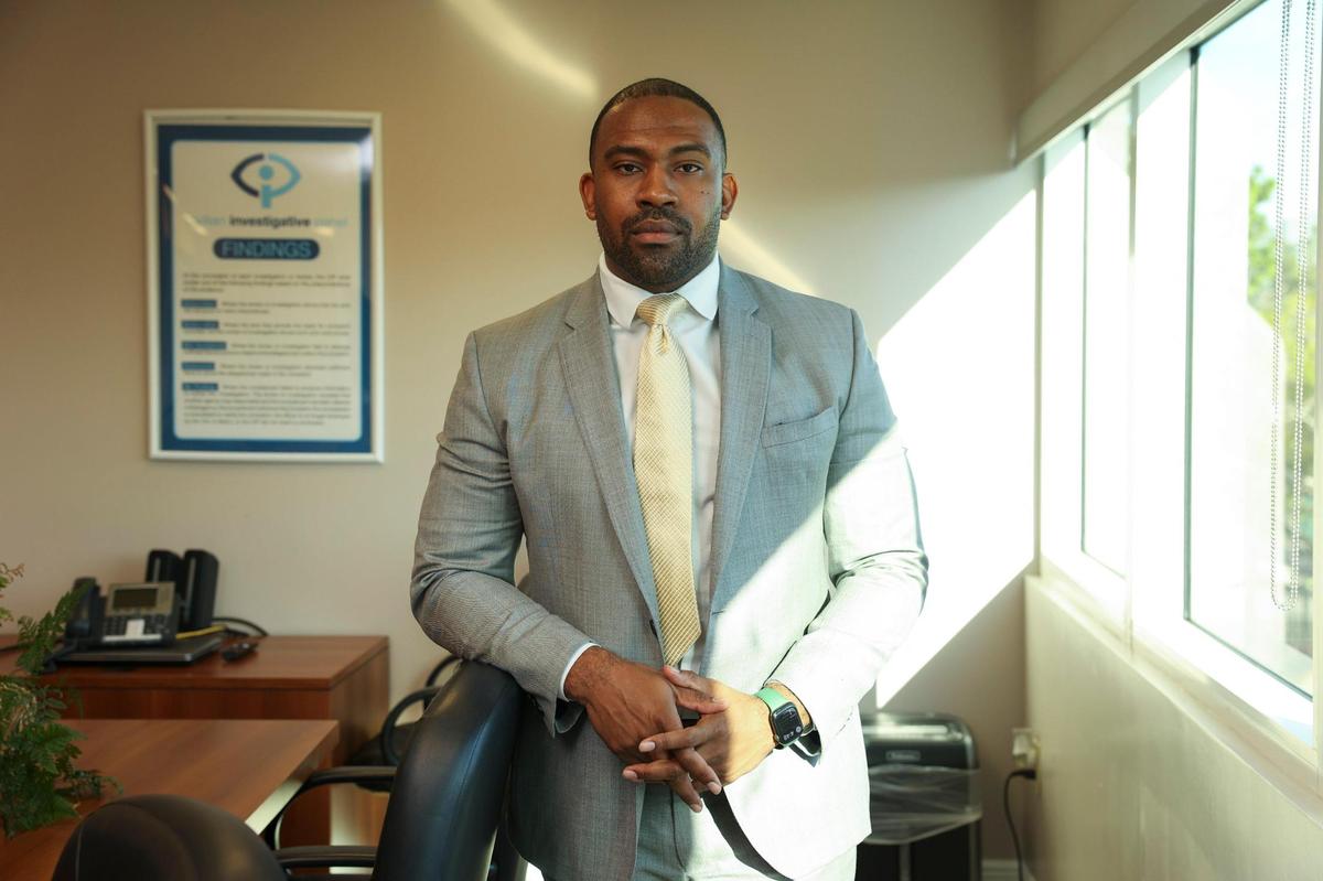 Rodney Jacobs, Assistant Director of the Miami Civilian Investigative Panel, poses in his office on Tuesday, Oct. 25, 2022, in Miami. The Civilian Investigative Panel works with the police force to find better ways to approach policing.