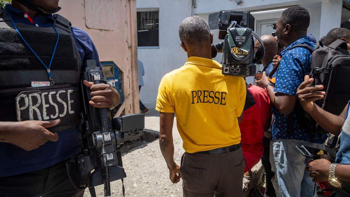 Haitian journalists in Port-au-Prince set up for a press conference at a local hospital.