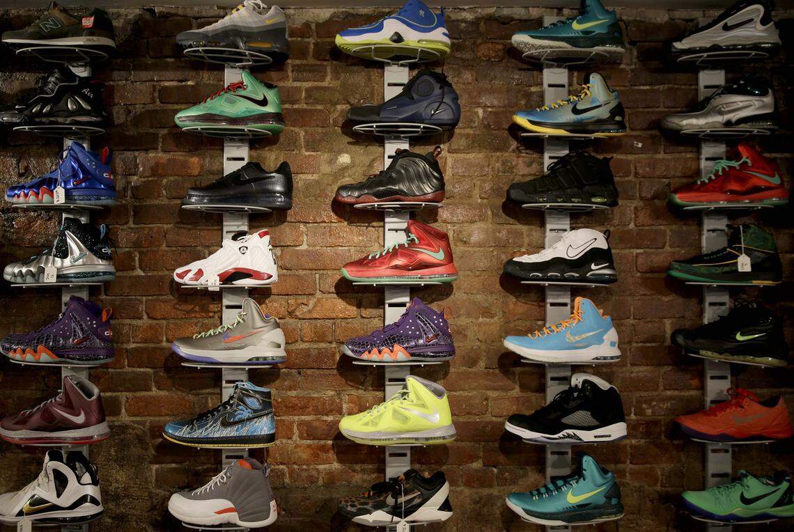 Collectible sneakers are displayed at Sneaker Pawn in the Harlem section of New York in January 2015. Basketball sneakers can resell for hundreds of dollars, depending on the model, the size of the production run and how easy it is to find a pair in good condition.