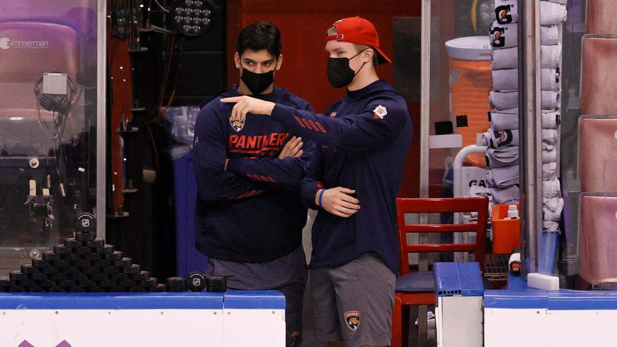 From left to right, Florida Panthers left wing Grigori Denisenko and Panthers center Anton Lundell talks before the start of an NHL against Los Angeles Kings of an NHL at the FLA Live Arena on Thursday, December 16, 2021 in Sunrise, Fl.