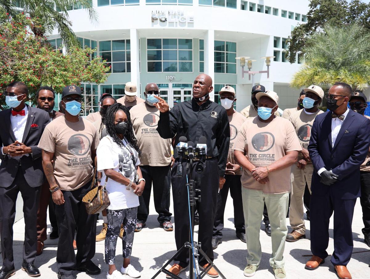 The executive director of the Circle of Brotherhood, Lyle Muhammad, holds a press conference outside Miami Beach Police Department Headquarters on Wednesday, Aug. 4, 2021.