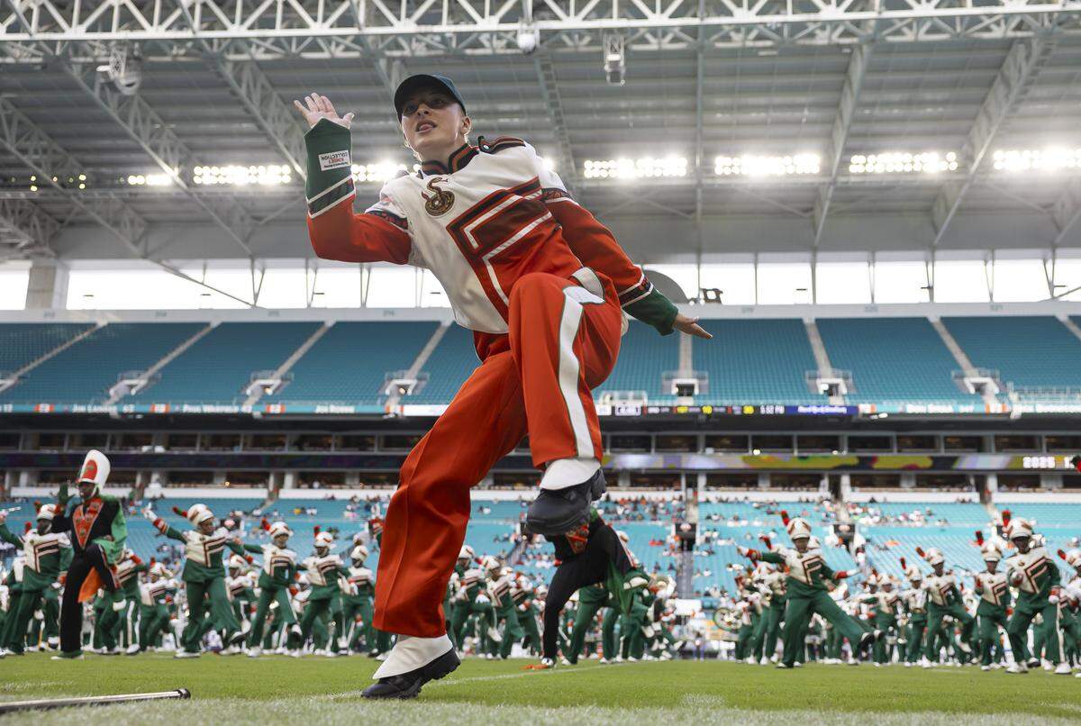 The Marching 100 performs during the halftime of the Orange Blossom Classic football game between Howard Bison and Florida A&M Rattlers at Hard Rock Stadium on Saturday, Aug. 30, 2025, in Miami Gardens, Fla.