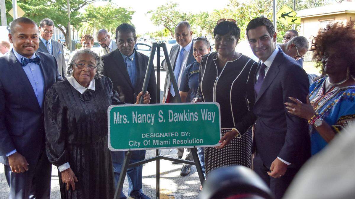 Miami and Miami-Dade County elected officials with Nancy Dawkins at the 2017 unveiling of Nancy Dawkins Way.