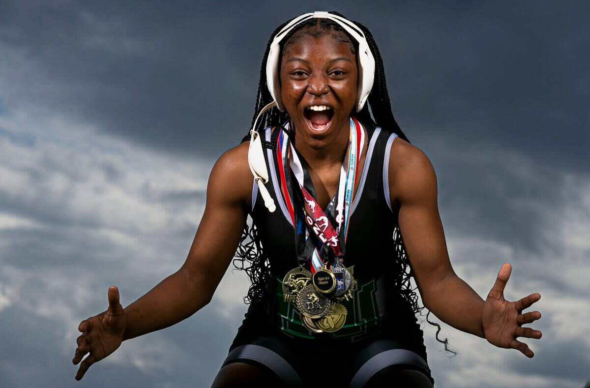 Dade Wrestler of the Year Mya Bethel, from North Miami Senior High School, is photographed at A.D. Barnes Park in Miami, Florida on Thursday, March 17, 2022.