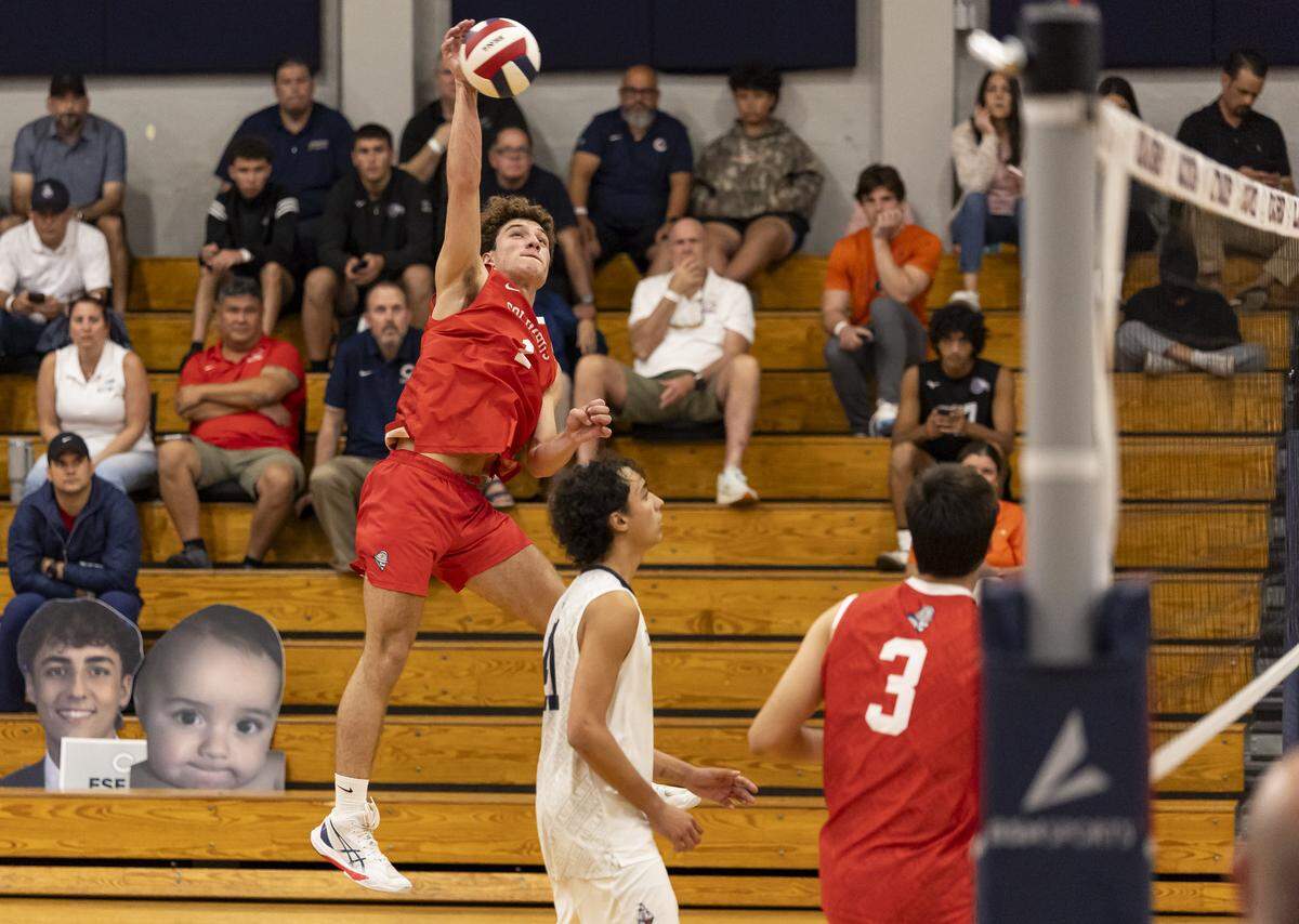 Columbus Explorers Kevin Perez (1) goes to spike the ball against the Varela Vipers during their GMAC volleyball tournament championship match at Christopher Columbus High School on Thursday, April 9, 2026, in Miami, Fla.