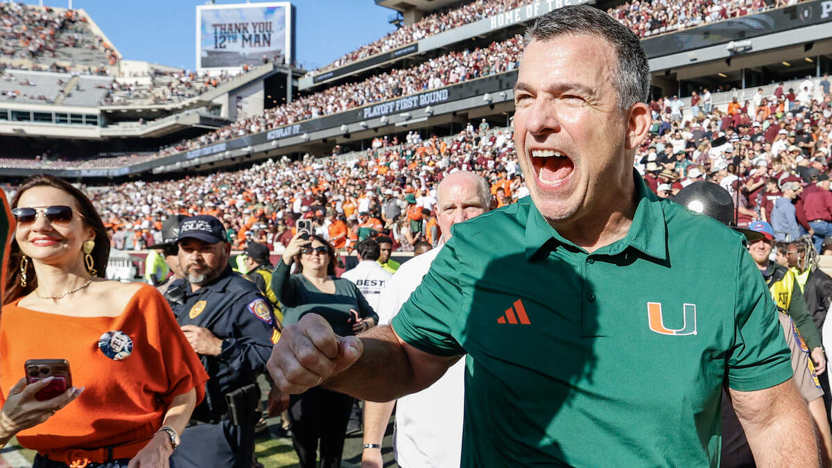 Miami Hurricanes head coach Mario Cristobal celebrates after the Canes defeat the Texas A&M Aggies in the first round of the 2025 College Football Playoff at Kyle Field at College Station, Texas, on Saturday, December 20, 2025.