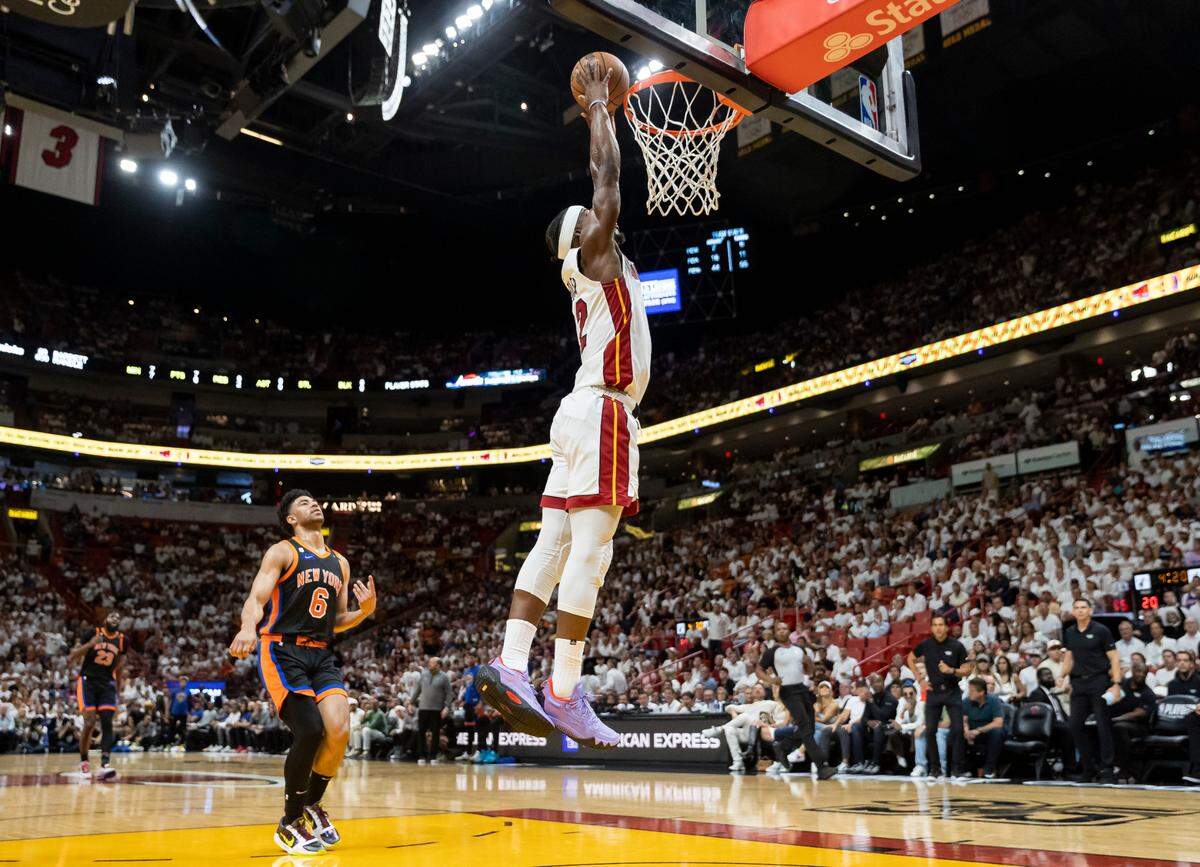 Miami Heat forward Jimmy Butler (22) dunks against the New York Knicks in the first quarter of Game 4 of the NBA Eastern Conference Semifinals at the Kaseya Center in Miami on Monday, May 8, 2023.