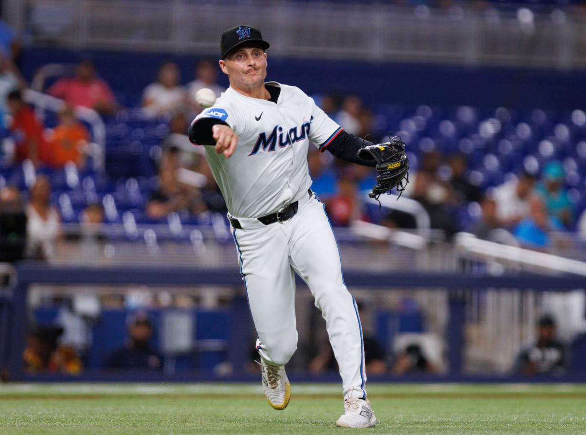 Miami Marlins relief pitcher Calvin Faucher (53) throws the ball to first during the ninth inning of a baseball game on Thursday, Aug. 8, 2024, at loanDepot Park in Miami.