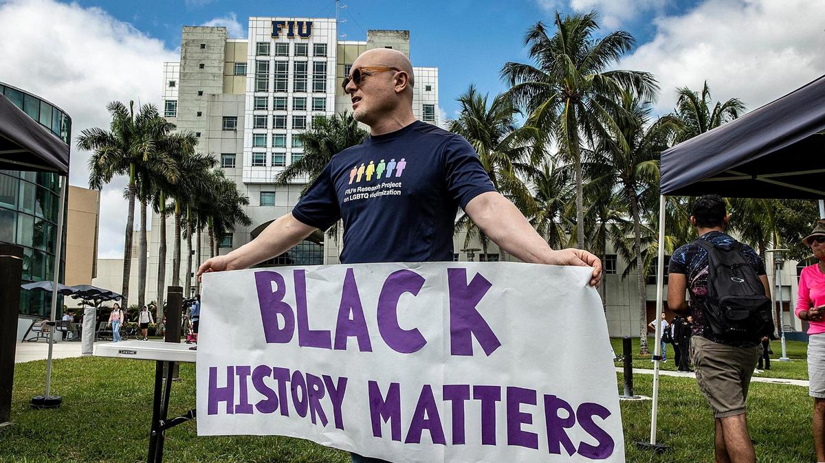 Florida International University professor Besiki Luka Kutateladze joined a group of the students, staff and community members during a Feb. 23, 2023, protest over efforts to eliminate diversity, equity and inclusion (DEI) programs in the state’s higher-education system.