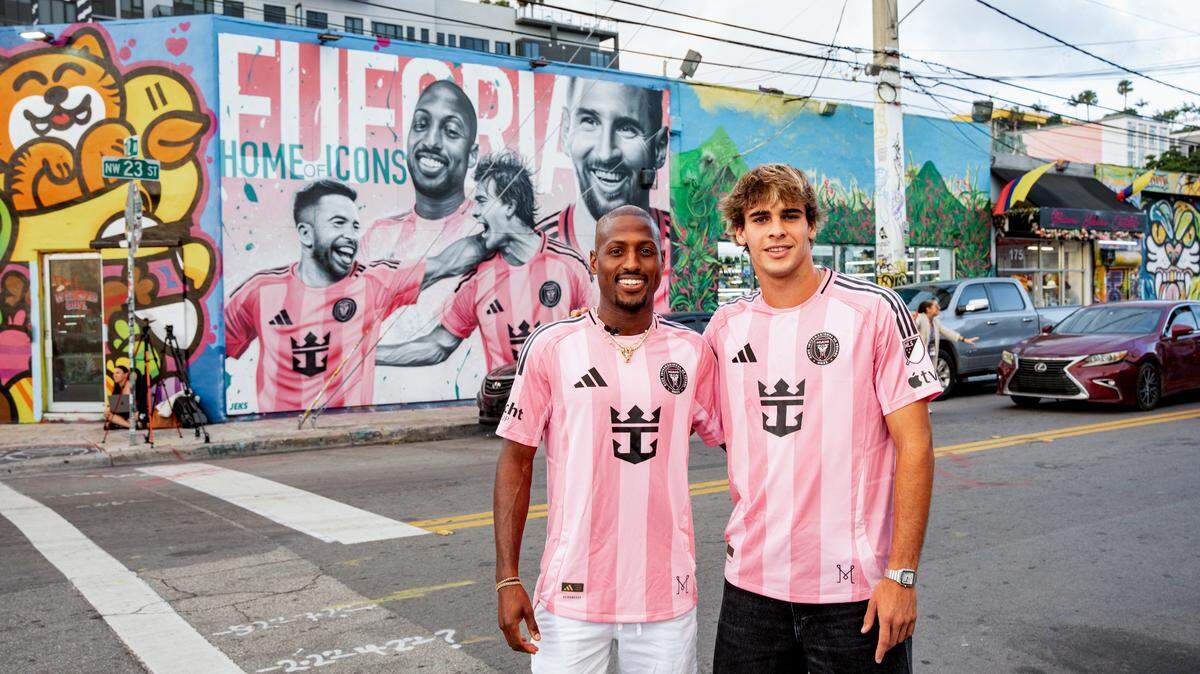 Inter Miami players Fafa Picault of Cutler Bay (left) and Benja Cremaschi of Key Biscayne (right) model their new “Euforia” jerseys in front of a Wynwood mural that includes their faces, along with Lionel Messi and Jordi Alba. 