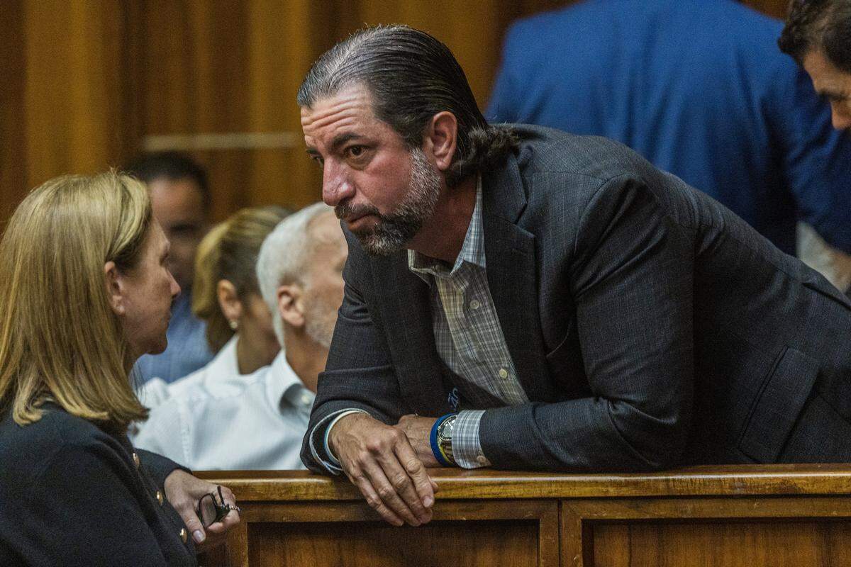 Andres Fernandez, father of Luciana Fernandez, who died in a boat crash, talks with Miami Dade State Attorney Prosecutor Laura Adams, during a motion hearing of defendant George Pino, who is facing vessel homicide charges related to the 2022 boat crash that killed Luciana, an Our Lady of Lourdes Academy student, in front of Judge Marisa Tinkler Mendez at Courtroom 4-6, in the Richard E. Gerstein Justice Building, on Wednesday, May 27, 2026.