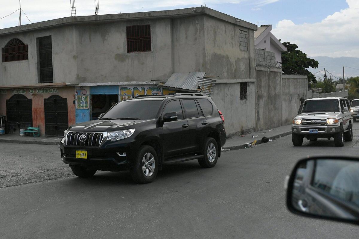 Haiti’s first lady Martine Moïse is transported in a black vehicle after returning to Port-au-Prince, Haiti, Saturday, July 17, 2021, 10 days after her husband, President Jovenel Moïse, was assassinated in their home on July 7.