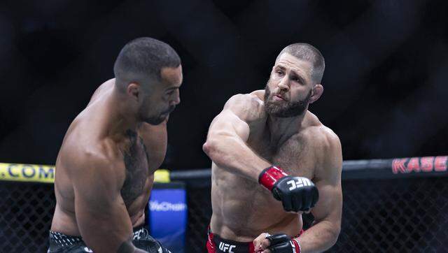 Jiří Procházka of Czechia and Carlos Ulberg of New Zealand fight in their light heavyweight title bout at UFC 327 at the Kaseya Center on Saturday, April 11, 2026, in downtown Miami, Fla.