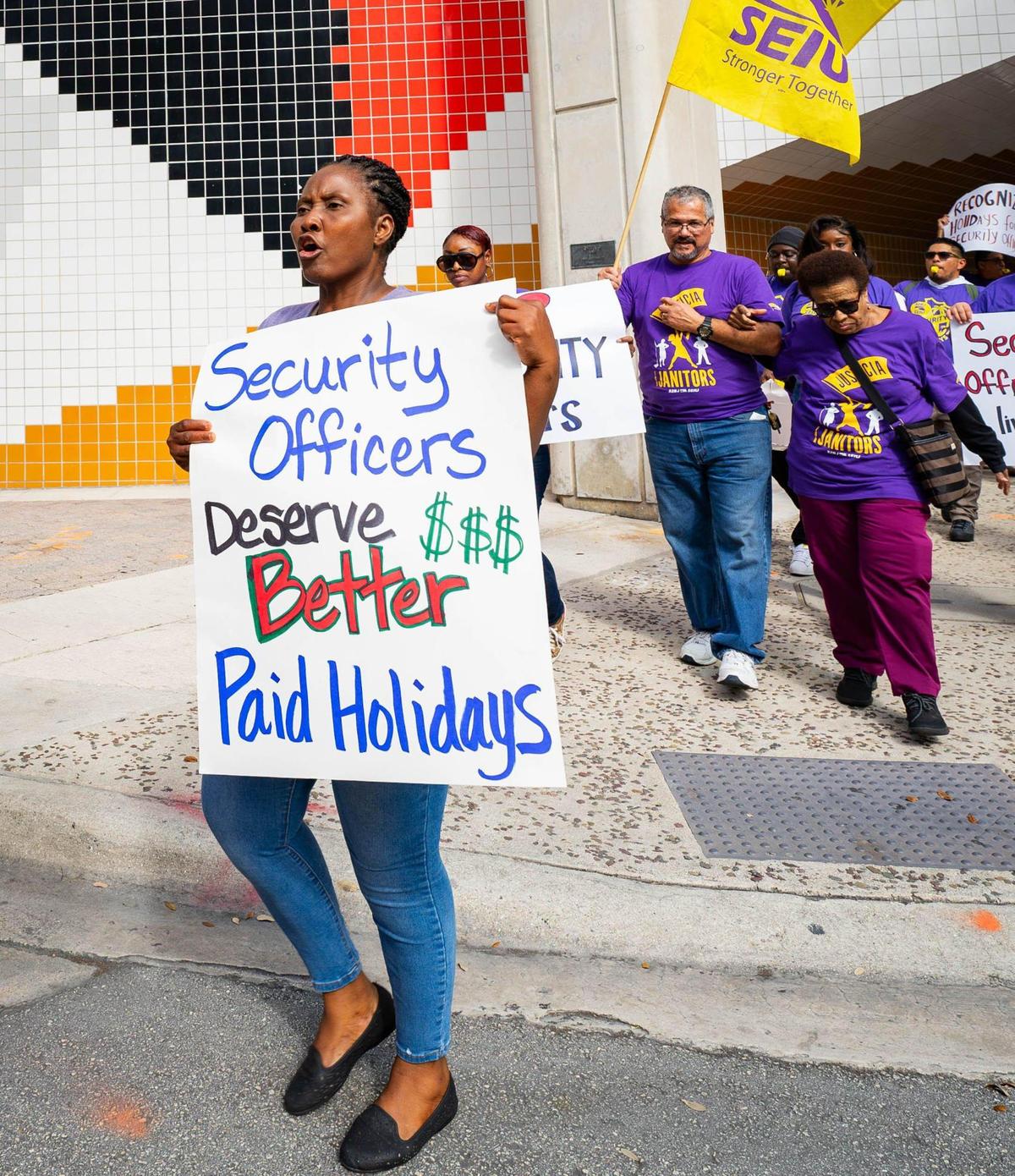 Contracted security officers protest for a new union contract outside the Broward Government Center in Fort Lauderdale on Tuesday, Nov. 12, 2024.