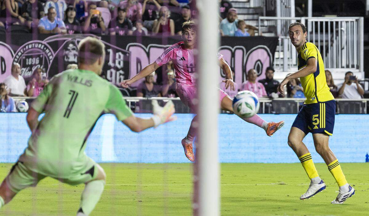 Inter Miami forward Mateo Silvetti (24) takes a shot toward Nashville SC goalkeeper Joe Willis (1) in the second half of match three of their MLS Playoffs series at Chase Stadium on Saturday, Nov. 8, 2025, in Fort Lauderdale, Fla.