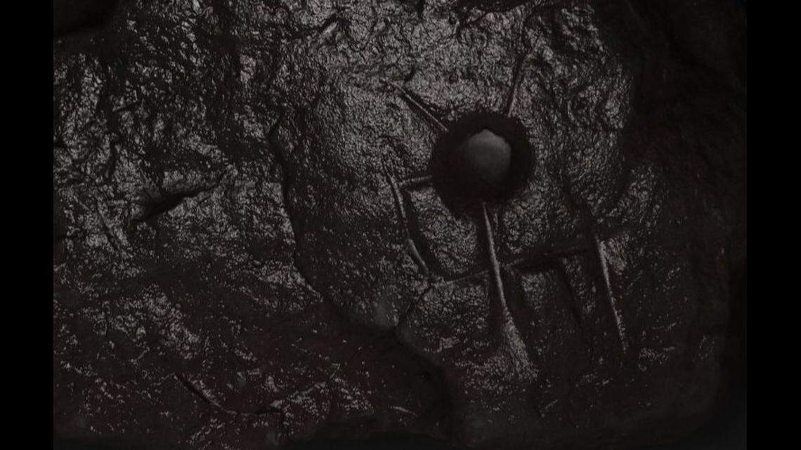 Baffled archaeologists in Shropshire unearthed a “unusually carved” sandstone at an Iron Age fort, officials said. Can you solve the riddle?