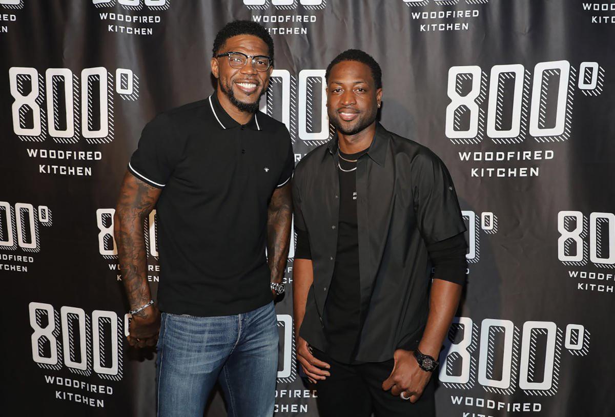 Udonis Haslem and Dwyane Wade attend a VIP opening party for 800 Woodfired Kitchen in September 2018.
