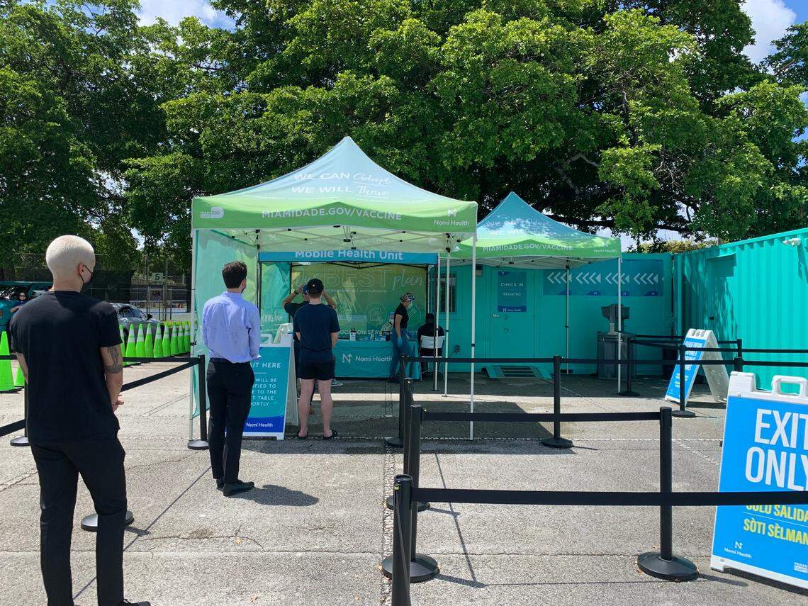 Patients who had appointments line up at Tropical Park’s monkeypox vaccination site at noon on the first day Miami-Dade opened a Nomi vaccination site at the park to offer the Jynneos vaccine on Aug. 12, 2022.