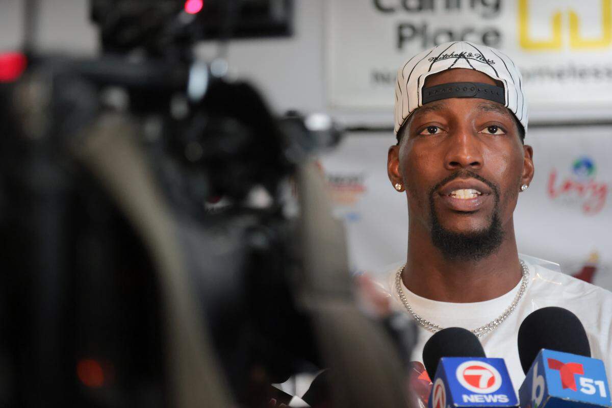 Miami Heat center Bam Adebayo speaks to reporters during the Miami Heat 34th Annual Thanksgiving Celebration at the Miami Rescue Mission at 2020 NW 1st. Ave., on Nov. 18, 2025, in Miami.