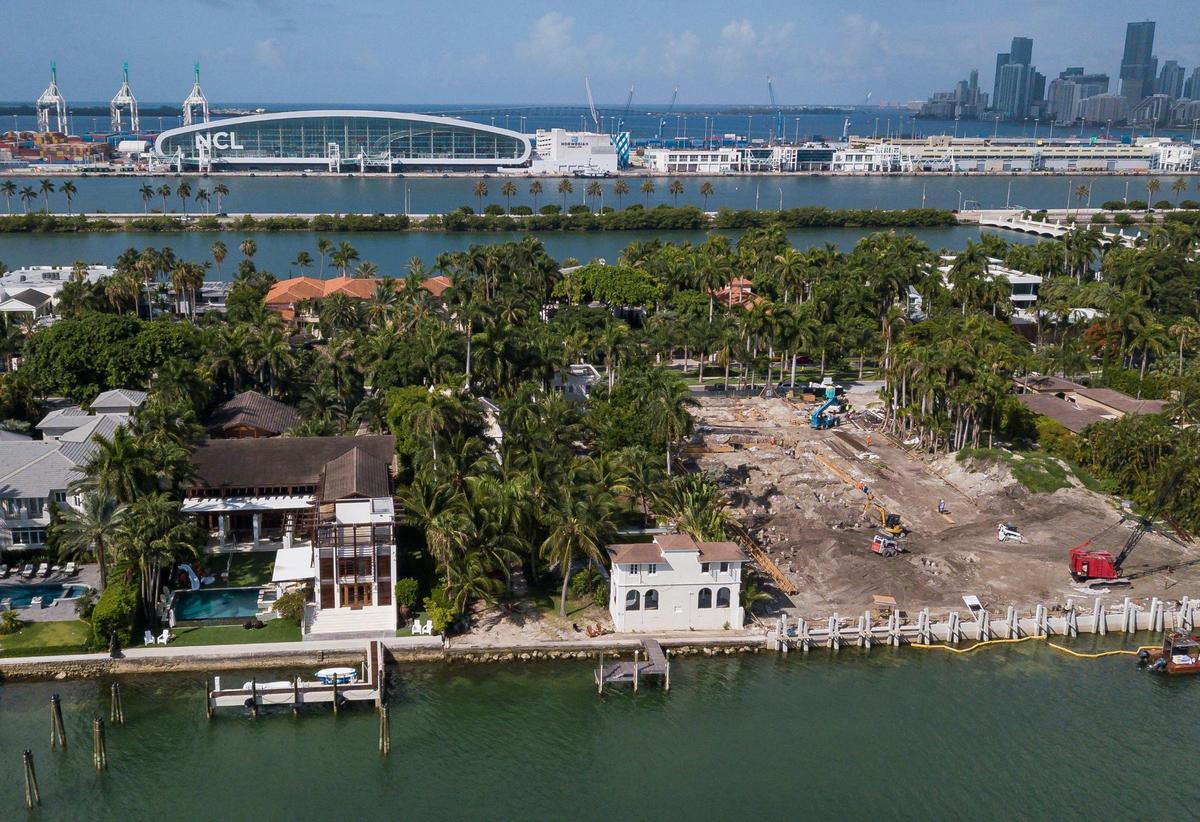 Florida Gov. Ron DeSantis signed a new law giving more power to owners seeking to demolish single-family homes at or below flood base elevation. Here’s an aerial view of 93 Palm Ave., center, in Miami Beach, Fla. Built in 1922, Al Capone’s final residence was among the first houses constructed on Palm Island.