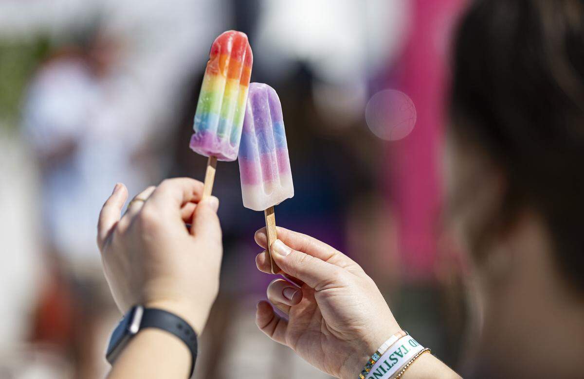 Brianna Delizzio holds two ice pops as she attends the Goya Foods' Grand Tasting Village during the Food Network South Beach Wine & Food Festival on Saturday, Feb. 21, 2026, in Miami Beach, Fla.