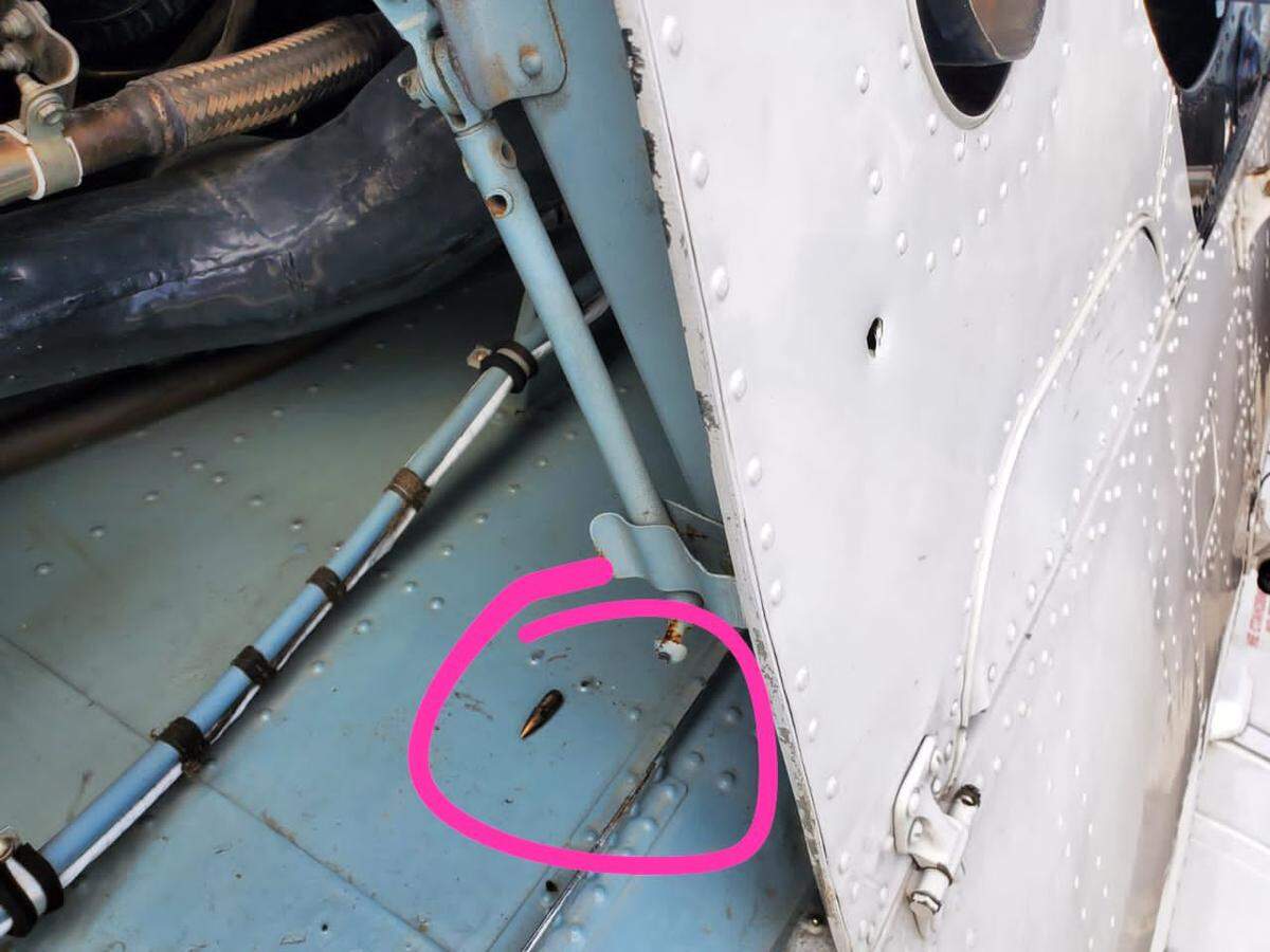A photo making the rounds of social media shows where a bullet pierced the skin of a United Nations helicopter.