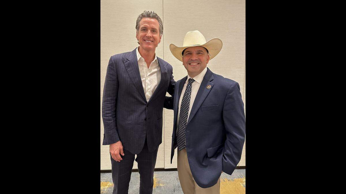 California Gov. Gavin Newsom, left, and Bexar County (Texas) Sheriff Javier Salazar.