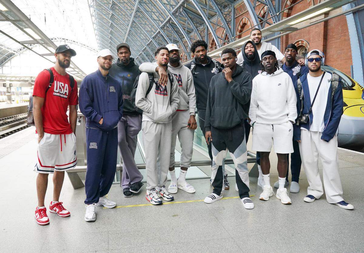 USA’s Men’s Olympic Basketball team (left to right) Derrick White , Steph Curry, Kevin Durant, Tyrese Haliburton, Lebron James, Joel Embiid, Anthony Edwards, Anthony Davis, Jayson Tatum (at back), Jrue Holiday, Bam Adebayo, and Devin Booker, at the Eurostar Terminal in London St. Pancras International as the team leave for the Paris 2024 Olympic Games.