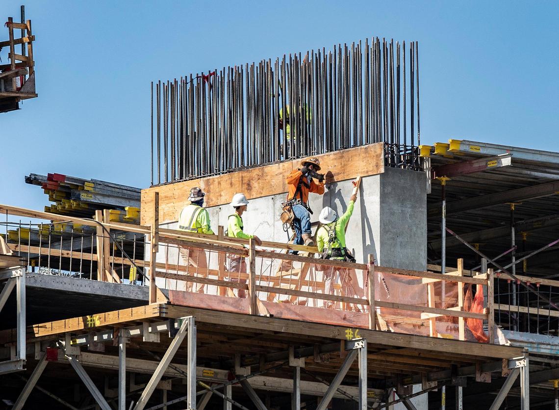 A construction crew puts up steel work at the 400 Biscayne Boulevard site on Thursday, April 2, 2020. The building, when completed, will rise 49 stories.
