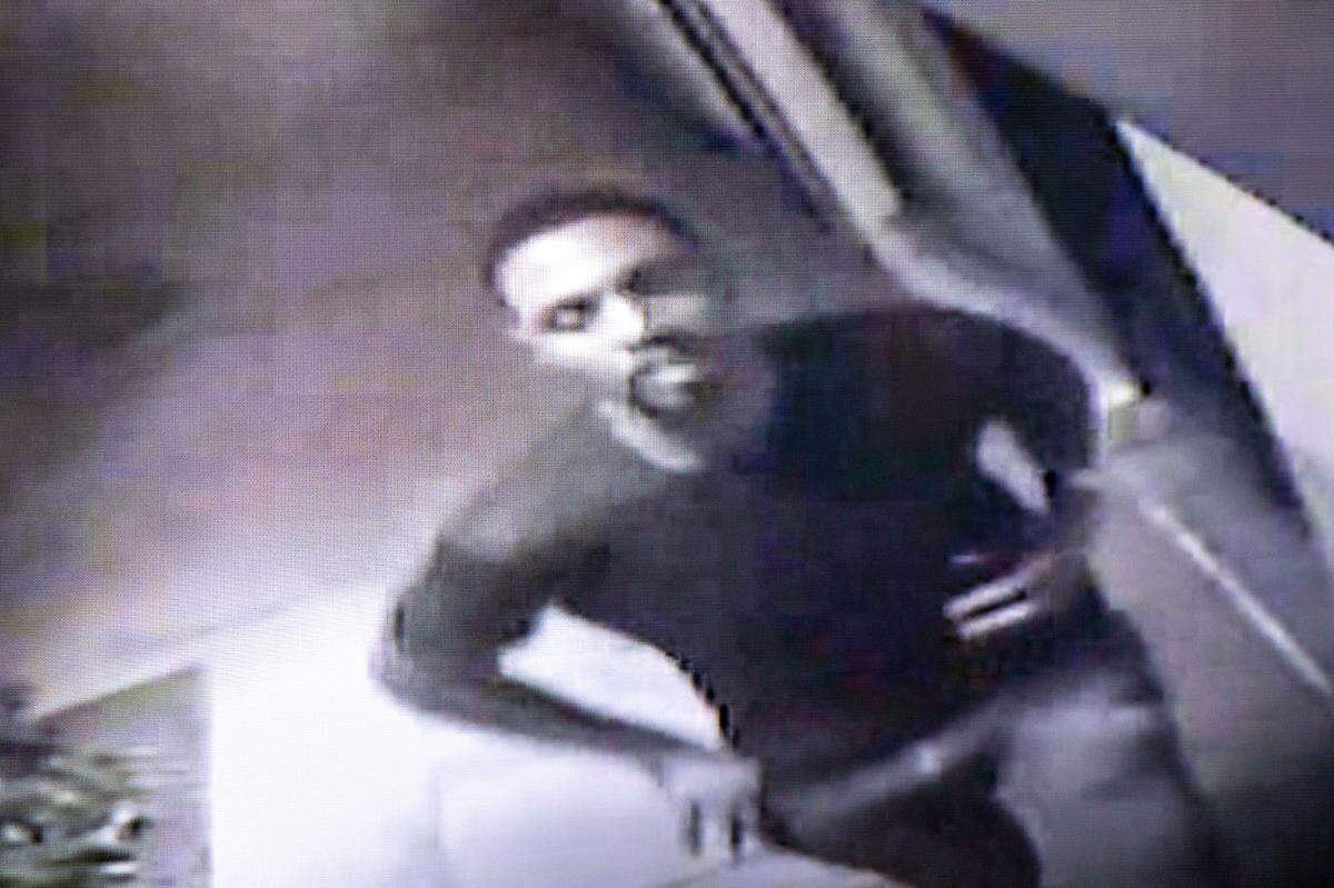 A still from CCTV footage provided by private business owners and presented at the State Attorney’s office press conference in Miami is said to show Willy Maceo running from the scene of a crime.