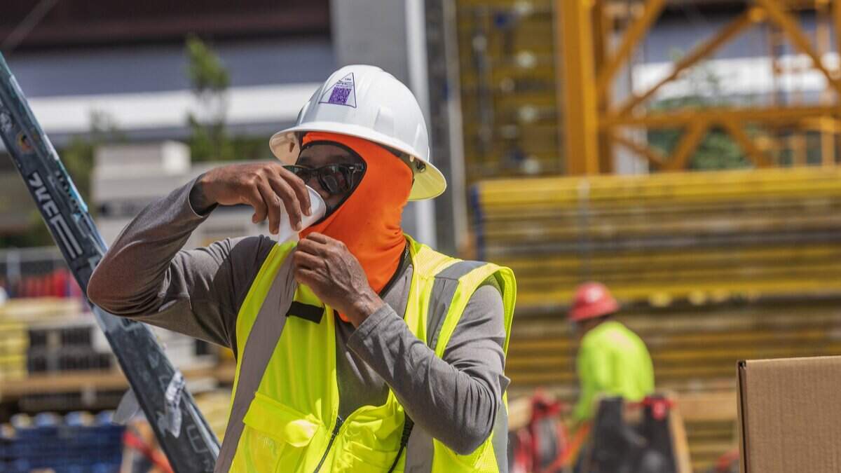 Construction worker Juan Araujo hydrates while working on Wynwood as a heat advisory is in effect for most of South Florida, on Wednesday, July 08, 2026.