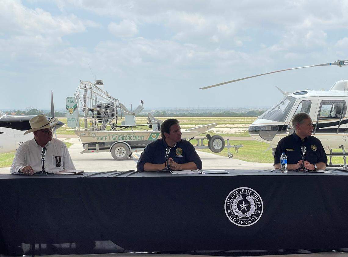 Florida Gov. Ron DeSantis and Texas Gov. Greg Abbott hold a press conference in Del Rio, Texas, to talk about a three-week effort by a contingent of Florida law enforcement officers to help enforce the U.S.-Mexico border.