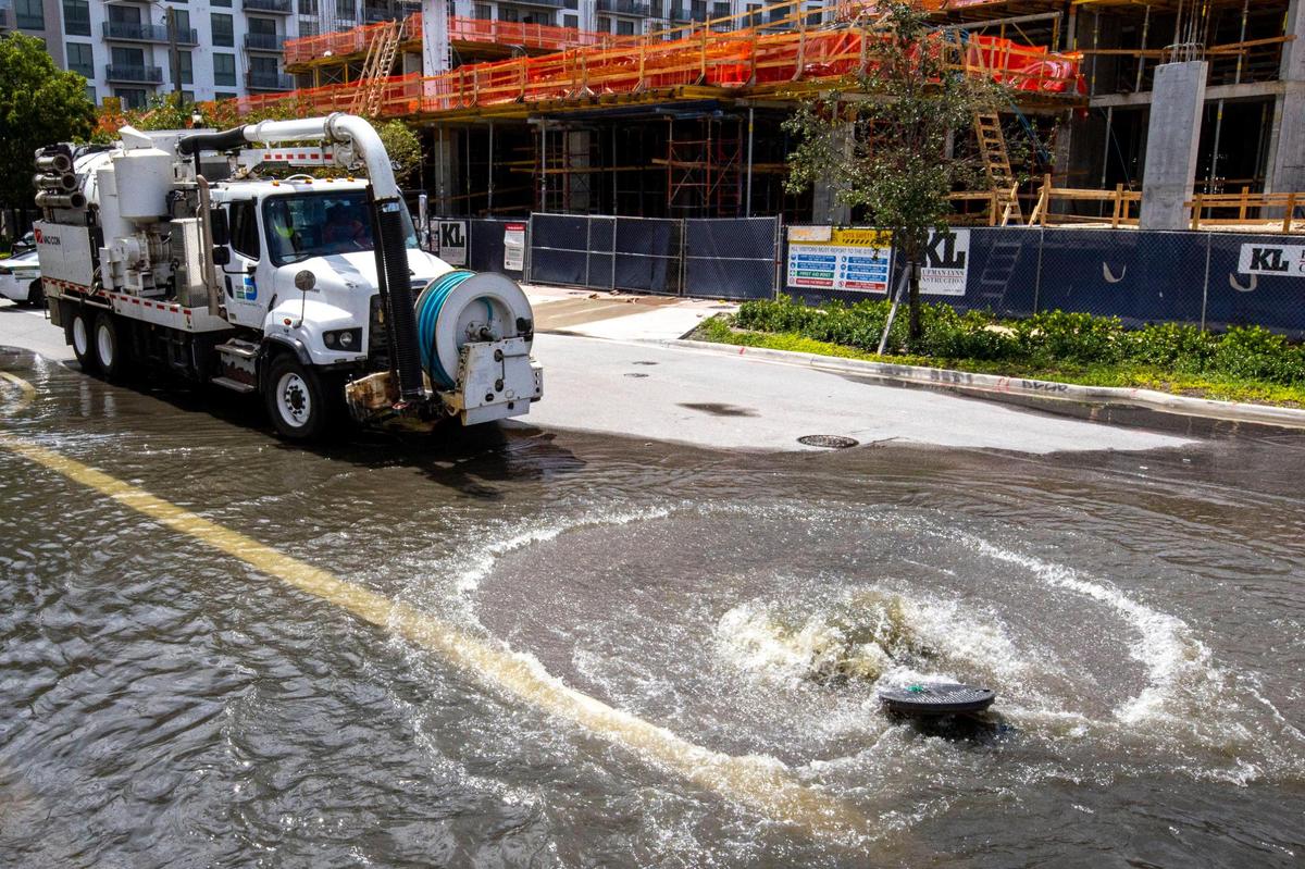 Sewage overflows through a manhole due to heavy rainfall in the Little Havana neighborhood of Miami, Florida, on Saturday, June 4, 2022. Heavy rainfall caused by a tropical disturbance overwhelmed Miami-Dade’s sewage treatment system, which exceeded capacity and causes wastewater to overflow in several locations in the center of the county.