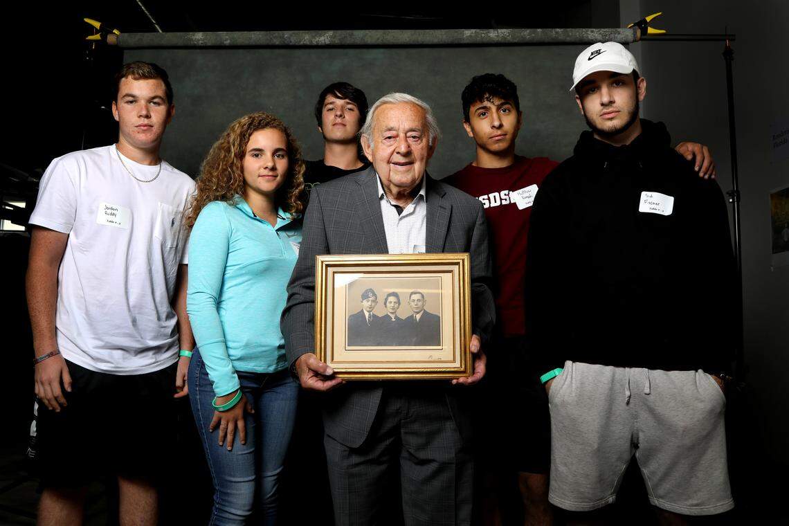 Armin Kraus, center, met with survivors of the Feb. 14, 2018 shooting at Marjory Stoneman Douglas High School in May. Kraus is a survivor of the Holocaust. The students were taking a course on the history of the Holocaust, taught by teacher Ivy Schamis, during the school shooting. Two students died inside the classroom.