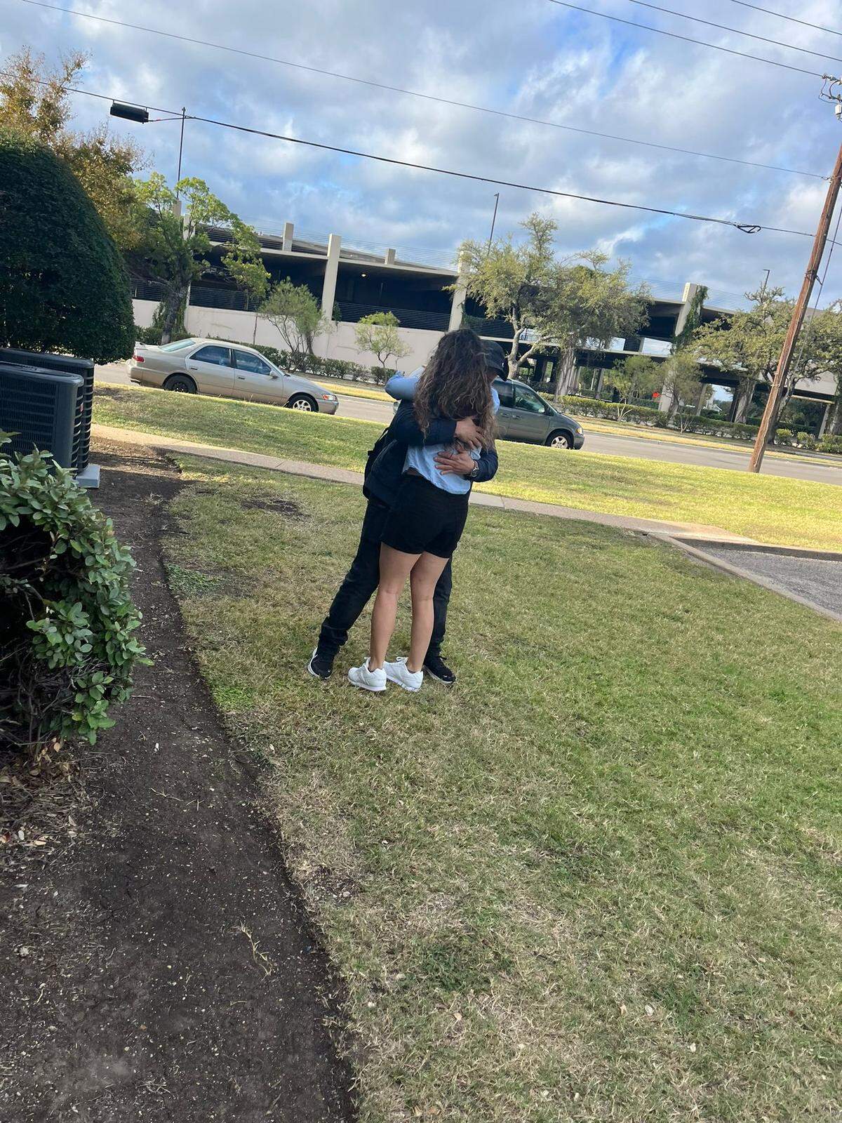 Denier Fernandez Polo hugging his cousin Dayneri Garcia after he was released from ICE custody in Broward Transitional Center on October 23, 2022