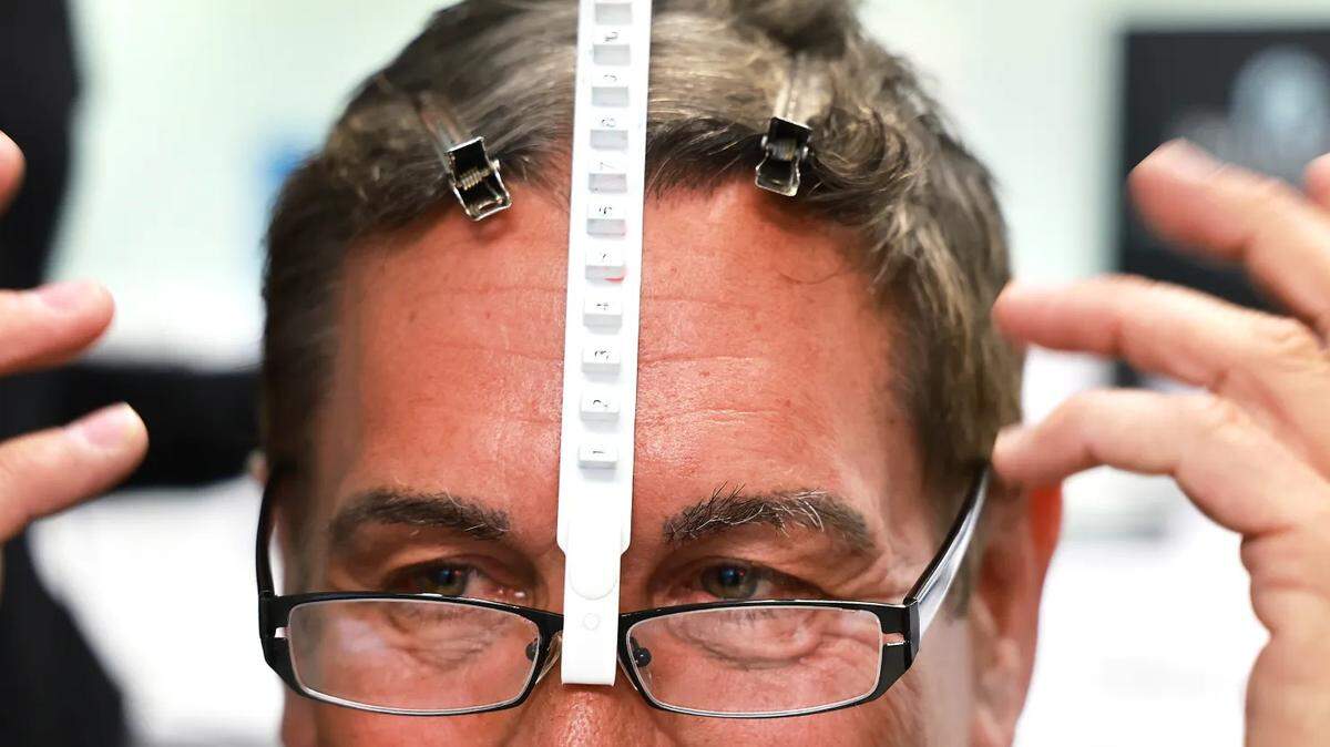 Ted Fisher, 59, of Boca Raton, undergoes a post-transplant hair-check measurement at Bauman Medical.